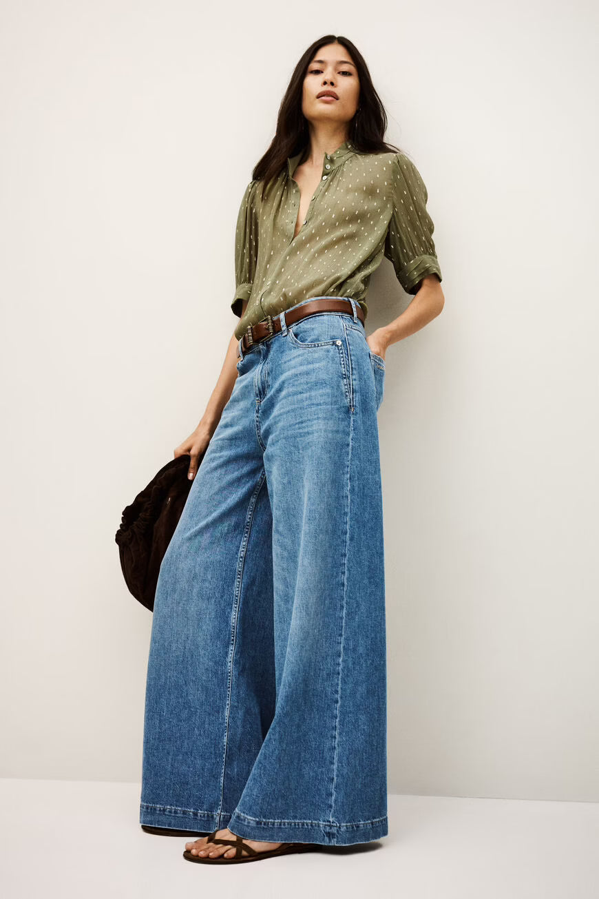 MUSC platėjančio silueto džinsai